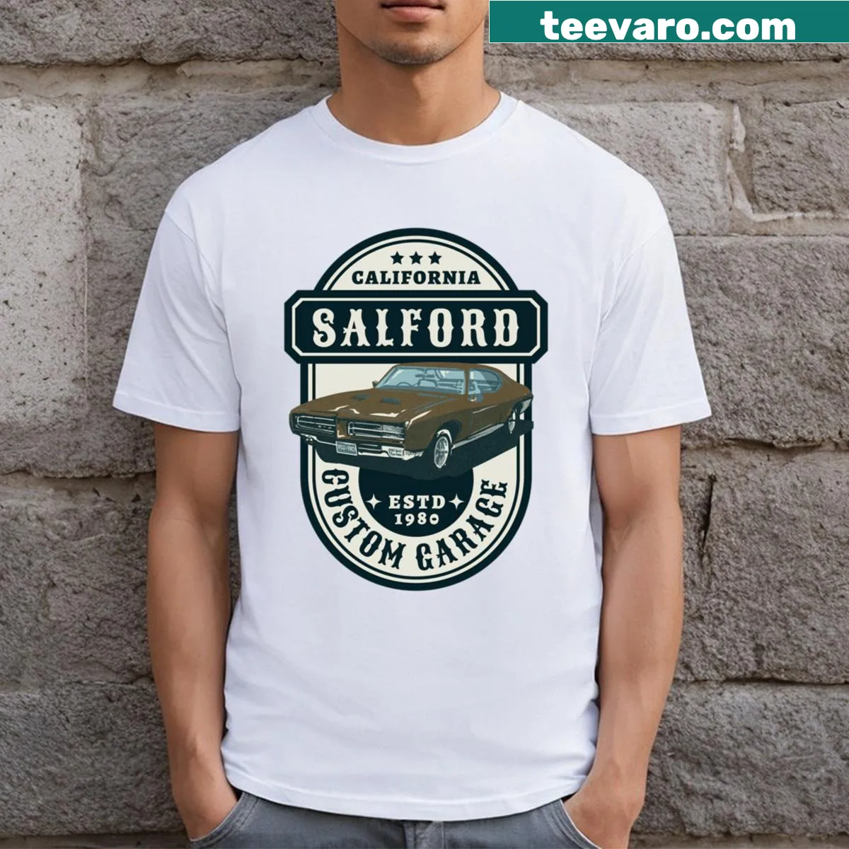 Badge emblem t-shirt representing Salford Garage — on a men's t-shirt