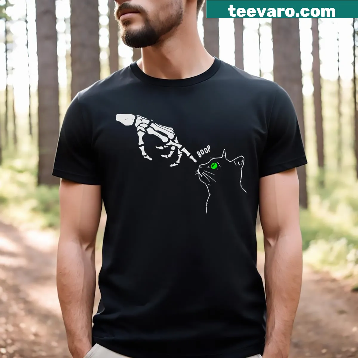 Funny Halloween t-shirt with a skeleton hand booping a cat's nose — on a men's t-shirt