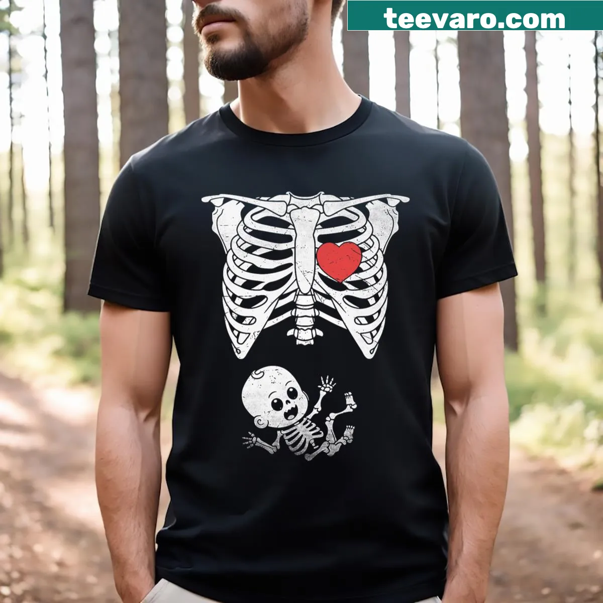 Skeleton X-ray pregnancy announcement graphic on Halloween T-shirt — on a men's t-shirt