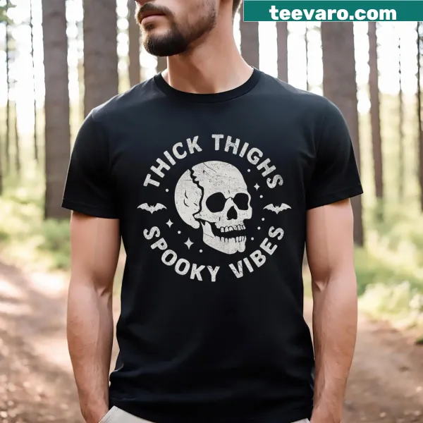Funny Halloween T-shirt with a skull and the phrase 'Thick Thighs Spooky Vibes'
