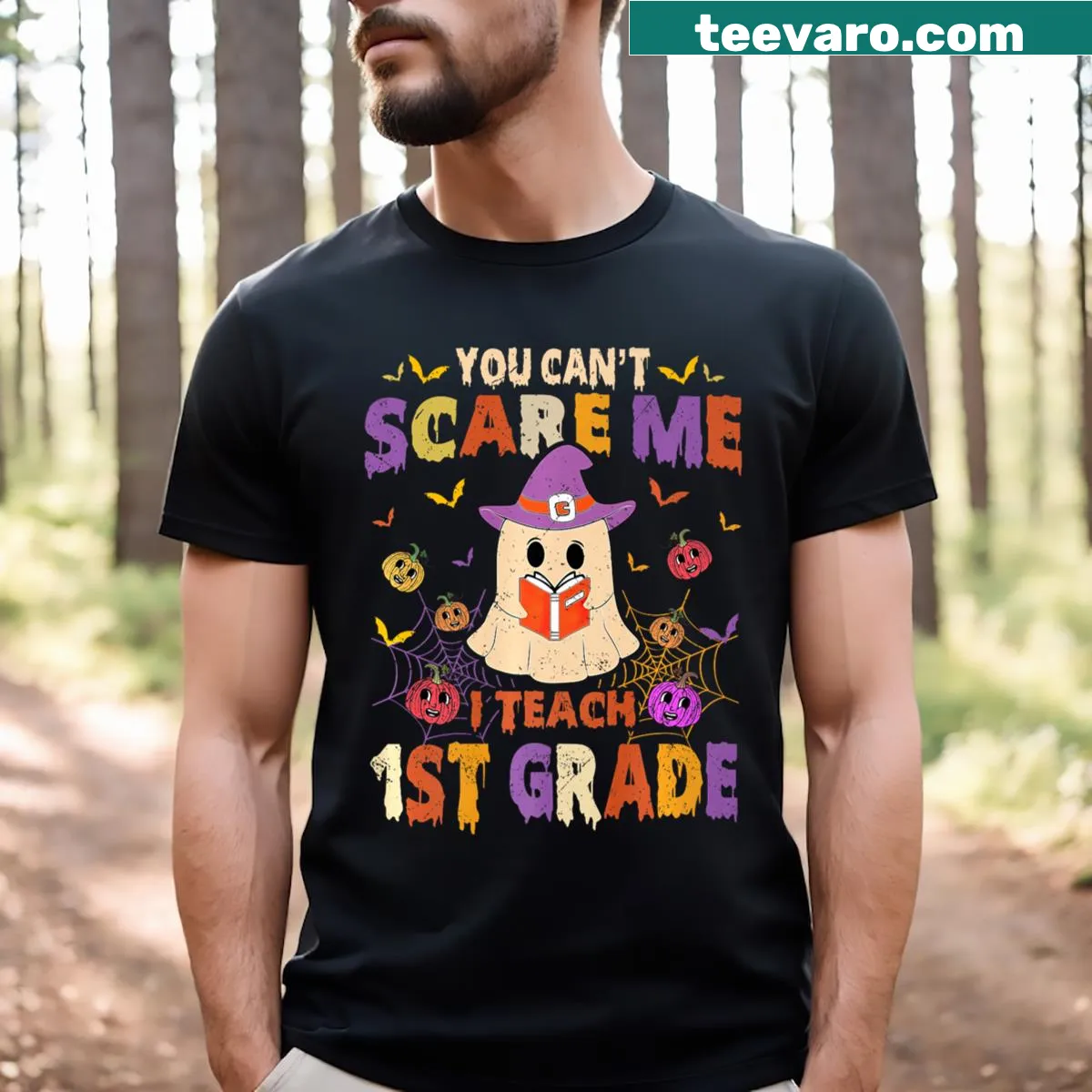 Humorous Halloween shirt for teachers reading 'You Can't Scare Me, I Teach 1st Grade' — on a men's t-shirt