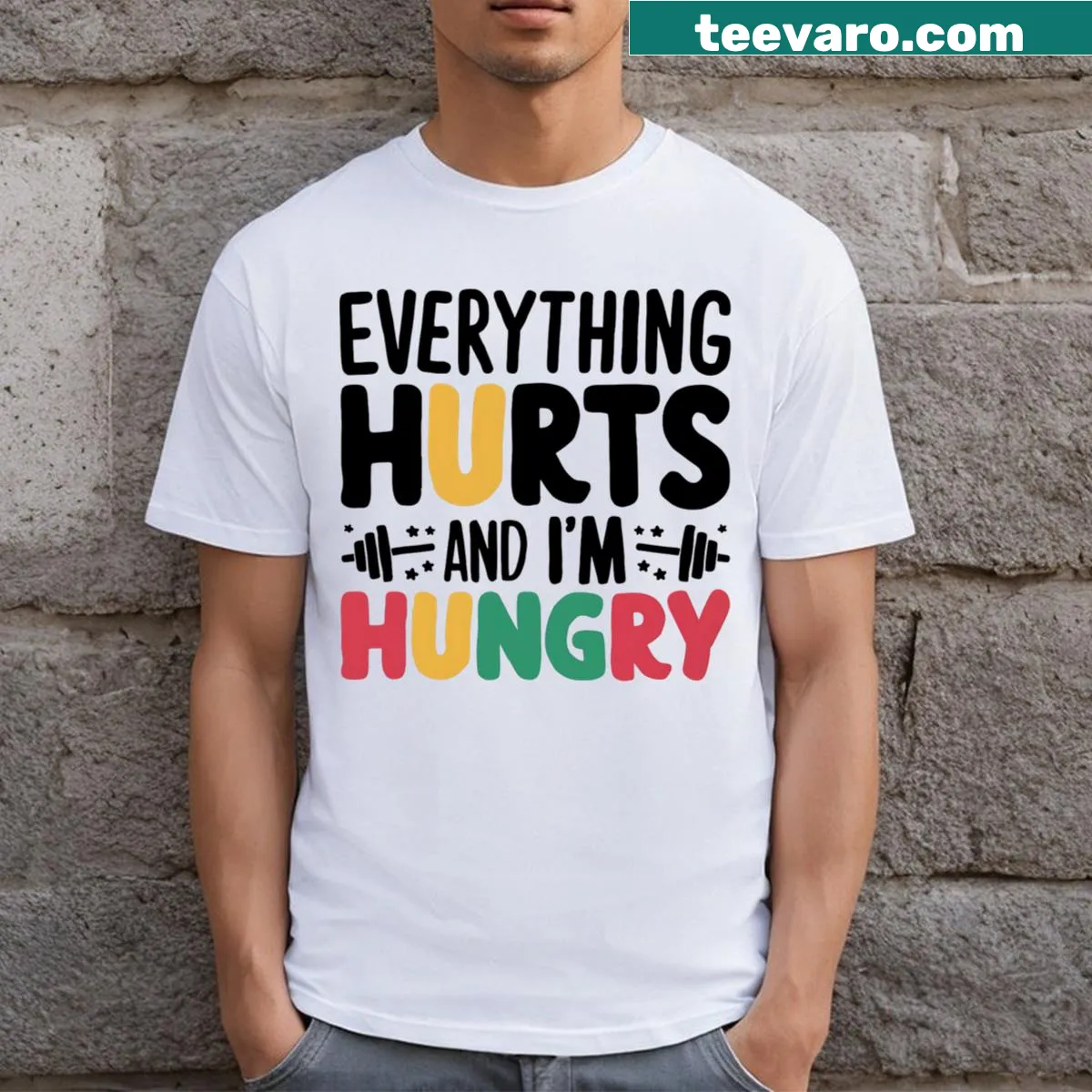 Funny workout t-shirt with the phrase 'Everything Hurts Im Hungry' — on a men's t-shirt
