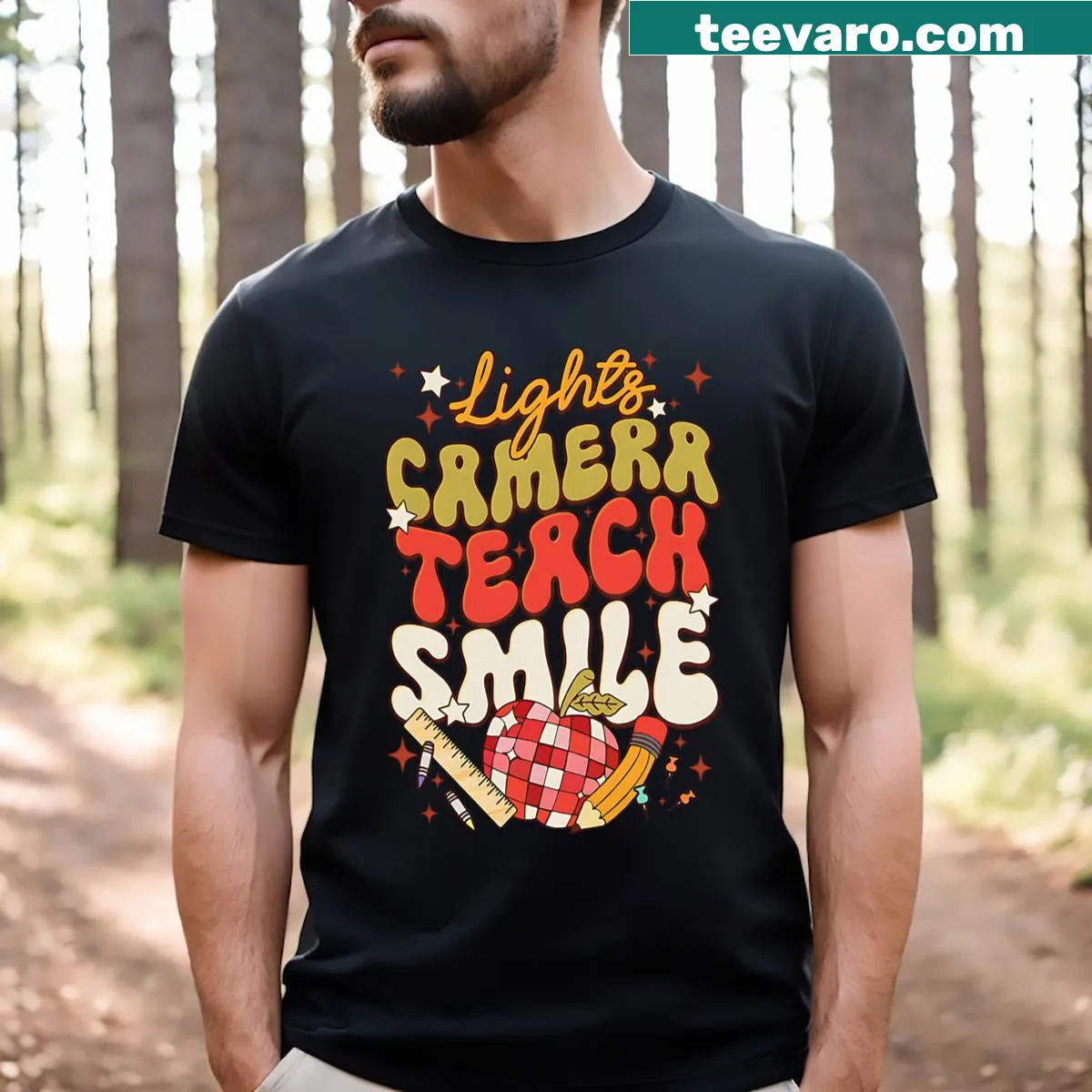 Teacher-themed shirt with Lights Camera Teach Smile text — on a men's t-shirt