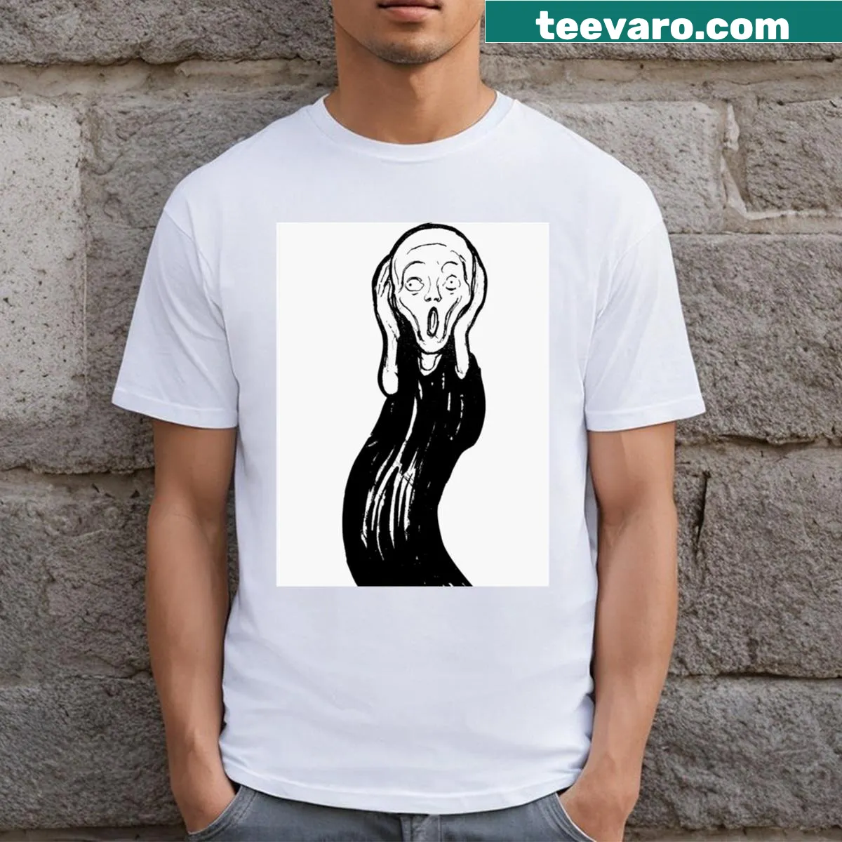 The Screamcrop T-shirt with iconic spooky graphic — on a men's t-shirt