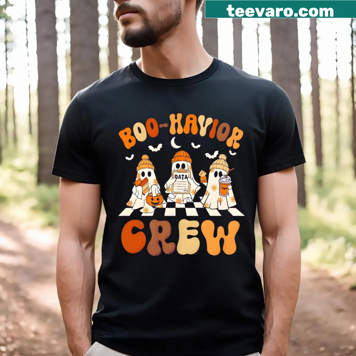 Cartoon ghost design labeled 'Boo Havior Crew' on T-shirt — on a men's t-shirt