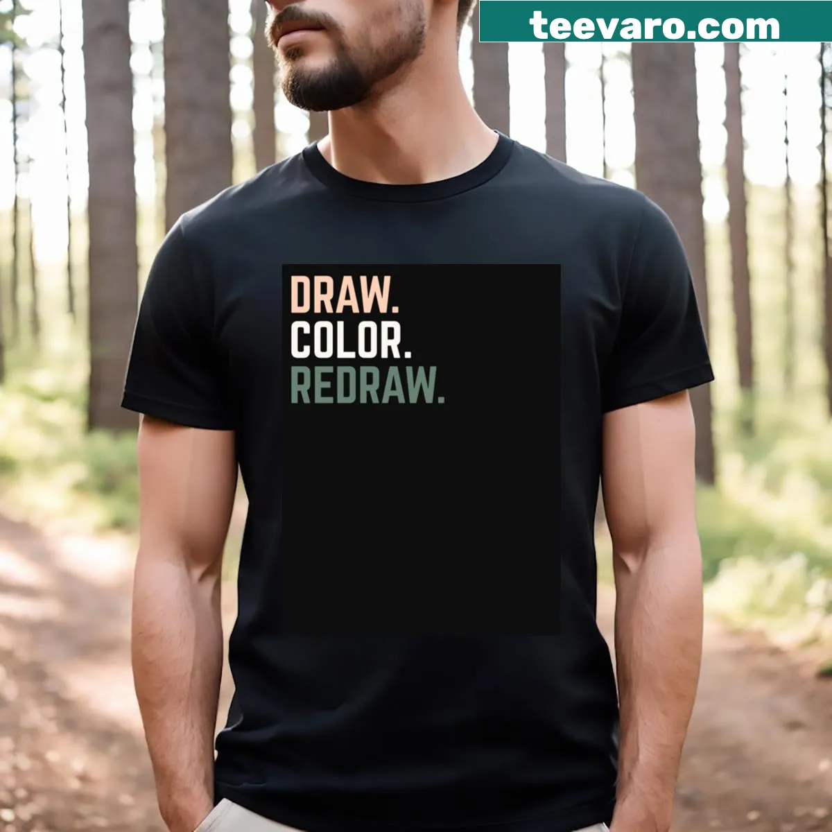 Art-themed shirt with the phrase Draw Color Redraw in bold typography. — on a men's t-shirt