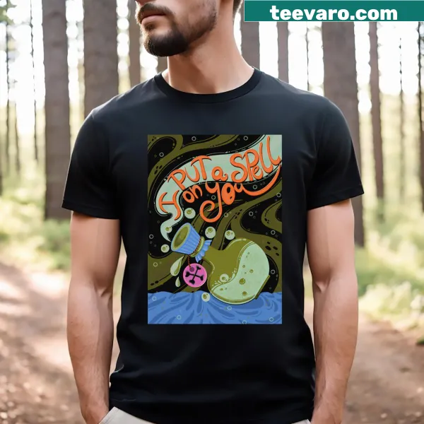 Halloween t-shirt with the text 'I Put A Spell On You' and whimsical graphics