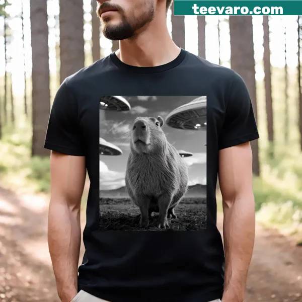 Black and white illustration of a capybara taking a selfie on a T-shirt