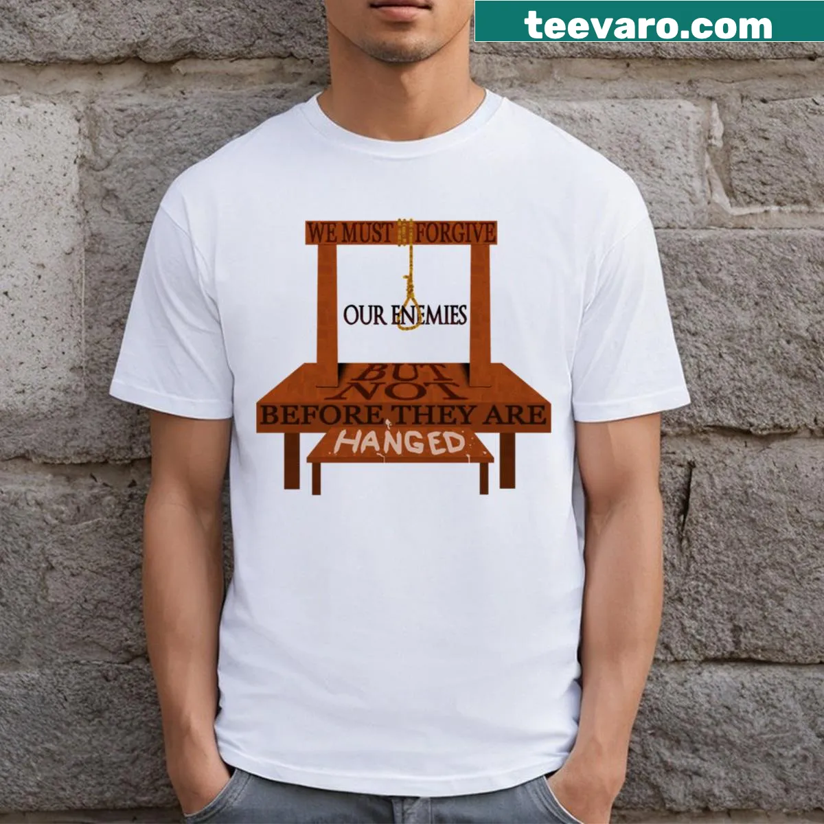 T-shirt featuring bold typography of the phrase 'Before They Are Hanged.' — on a men's t-shirt