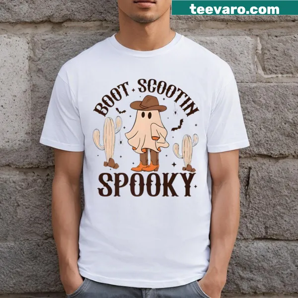 Halloween T-shirt with a spooky cowboy ghost riding a ghost cow