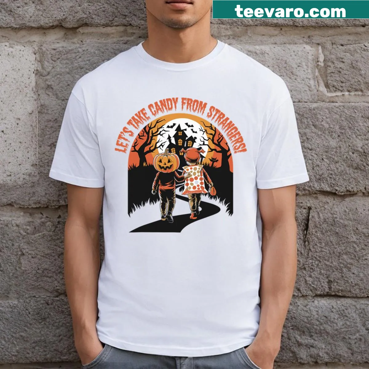 Humorous Halloween t-shirt with pumpkin and 'Let's Take Candy From Strangers' — on a men's t-shirt