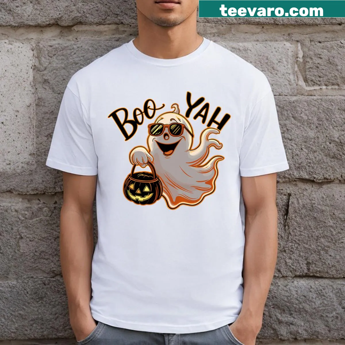 Humorous Halloween t-shirt featuring a playful ghost and the phrase 'Boo Yah'. — on a men's t-shirt