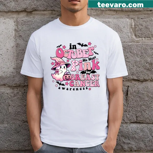 Kids T-shirt featuring a playful ghost design for Halloween with breast cancer awareness theme.