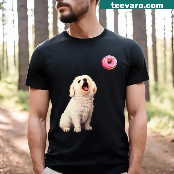 Cute Maltese dog looking at a donut on a T-shirt