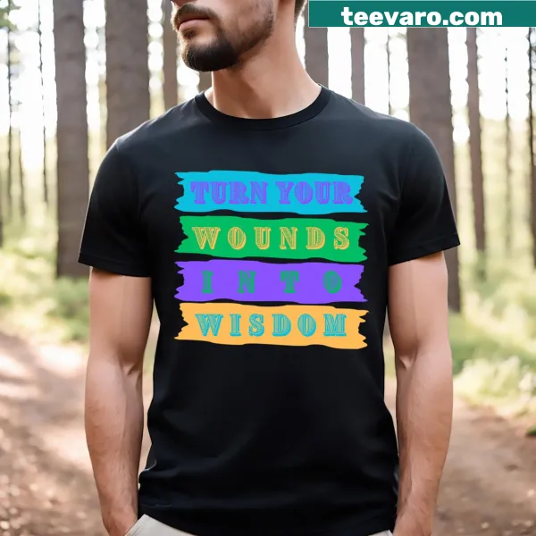 Inspirational T-shirt with the phrase 'Turn Your Wounds Into Wisdom'