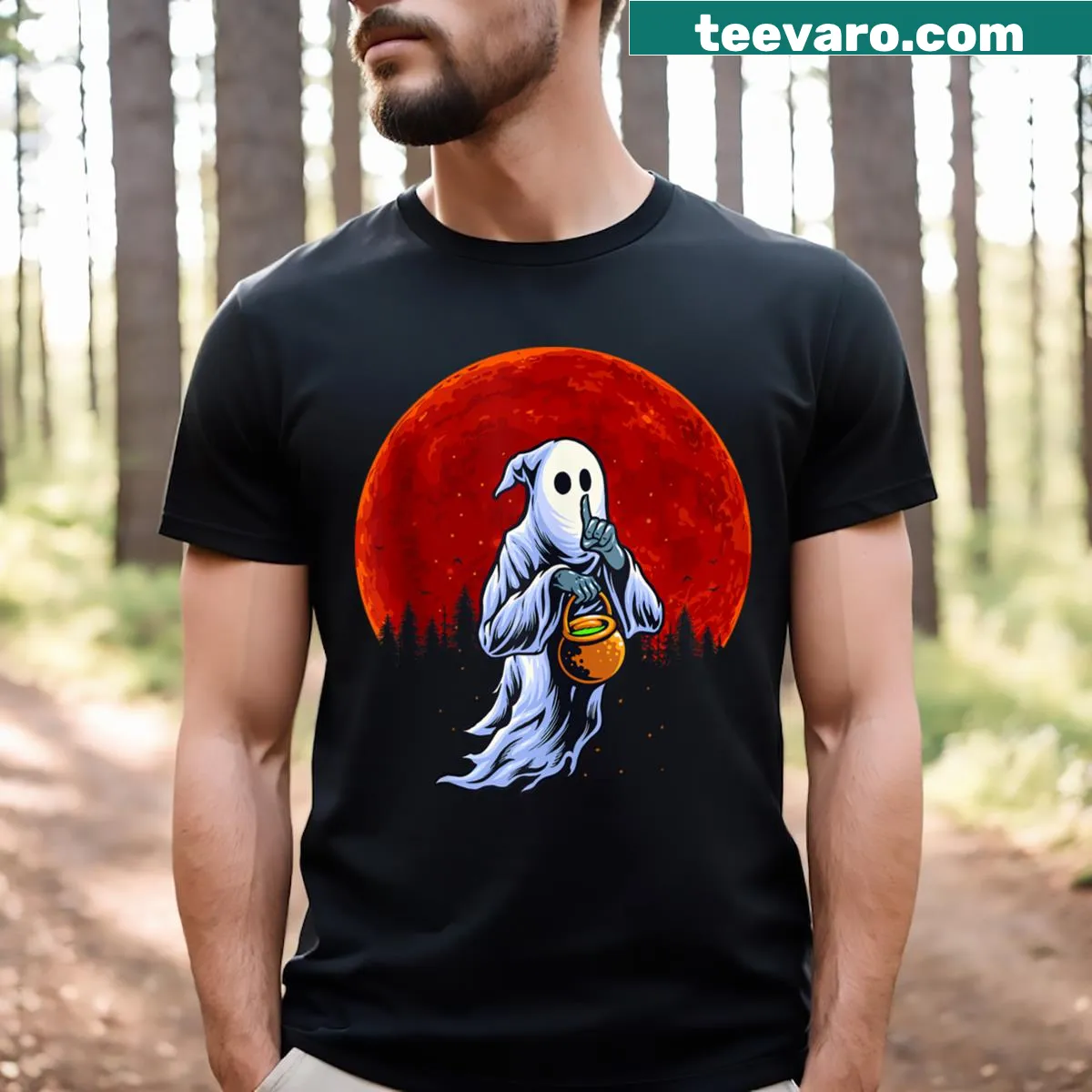 Ghost, witch, and pumpkin graphic on a Halloween T-shirt — on a men's t-shirt