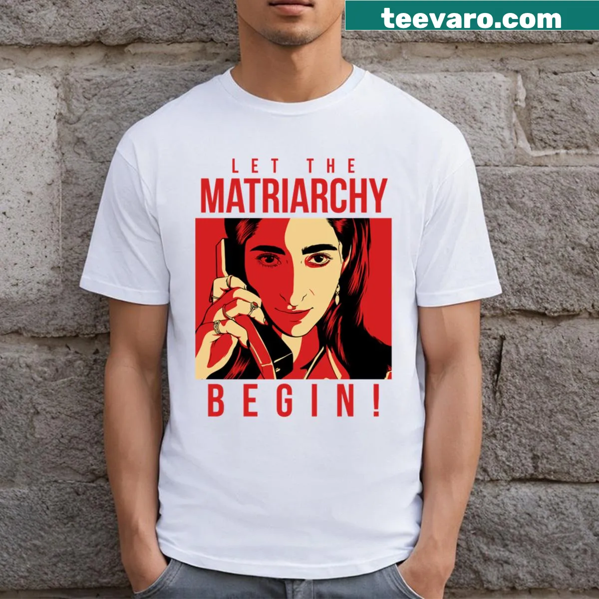 Statement t-shirt with bold text 'Let The Matriarchy Begin!' — on a men's t-shirt