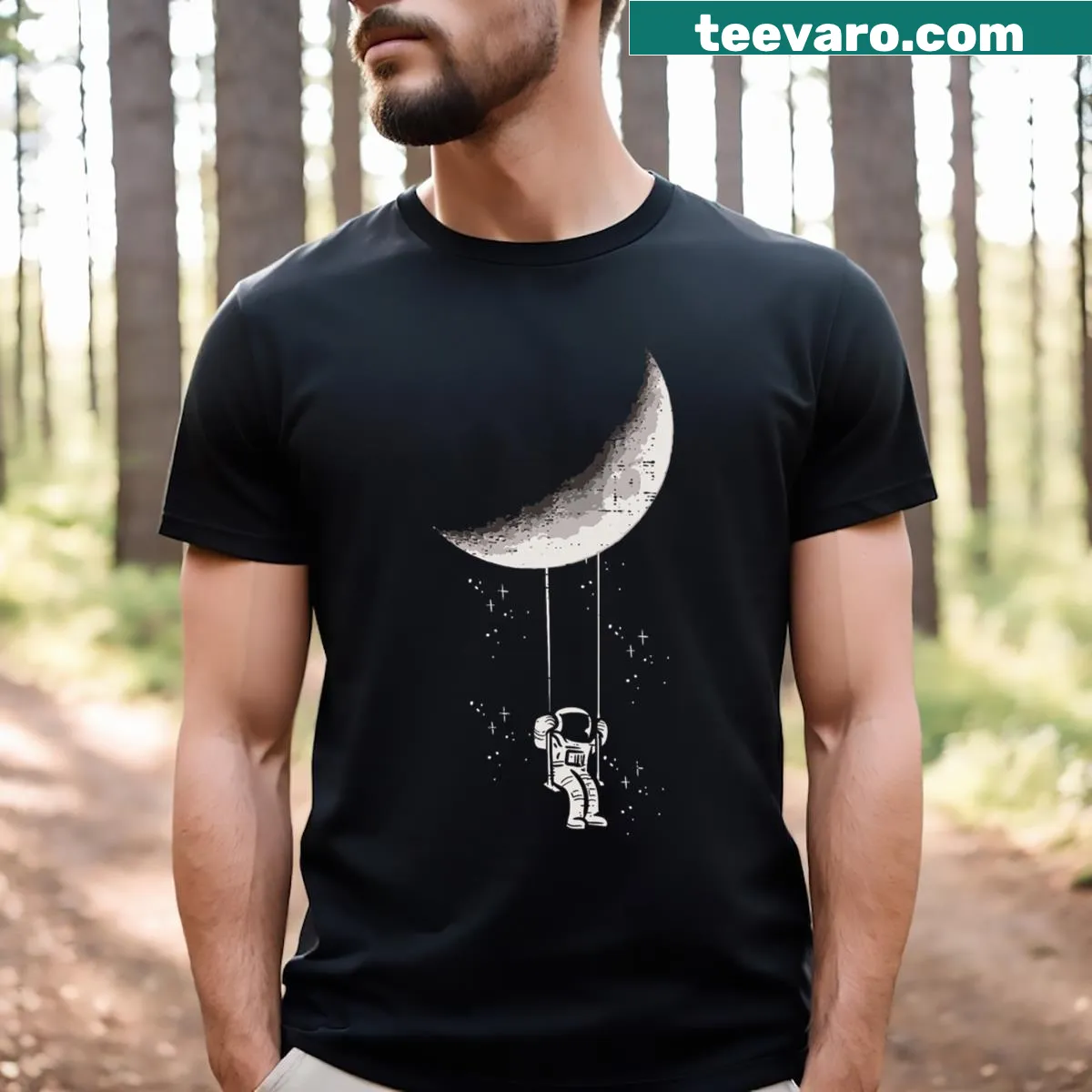 T-shirt featuring an astronaut swinging in space for kids and youth — on a men's t-shirt