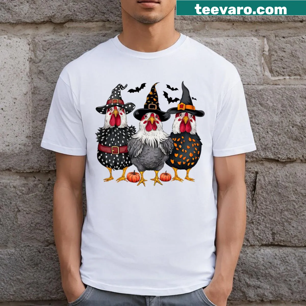 Cartoon chicken with witch hat and pumpkin design for Halloween. — on a men's t-shirt