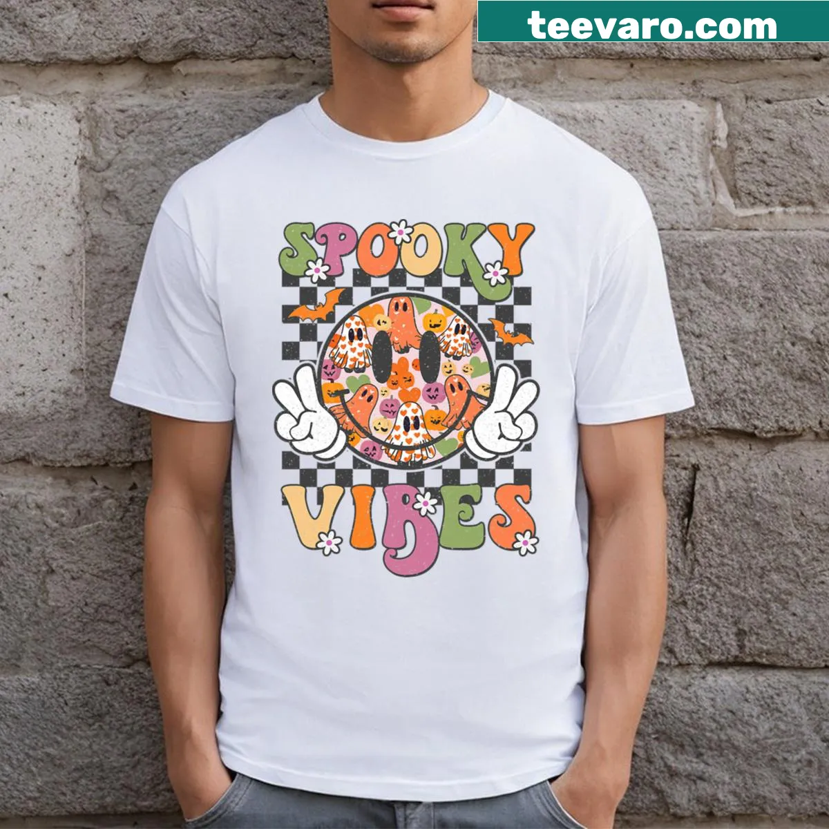 Funny Halloween t-shirt with a smiling ghost face graphic — on a men's t-shirt