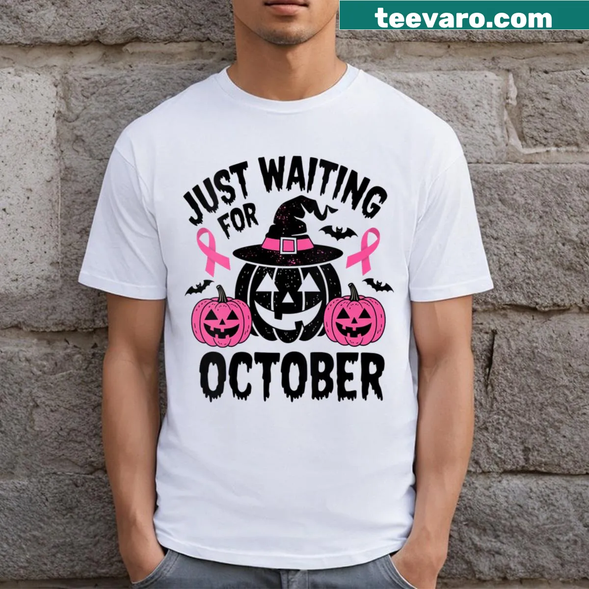 V-neck t-shirt featuring pink pumpkins for Halloween and breast cancer awareness. — on a men's t-shirt