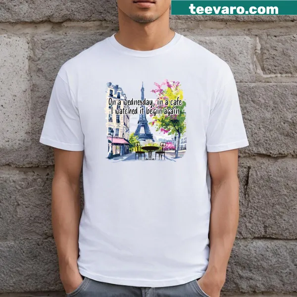 T-shirt featuring 'Begin Again' text with a Paris theme
