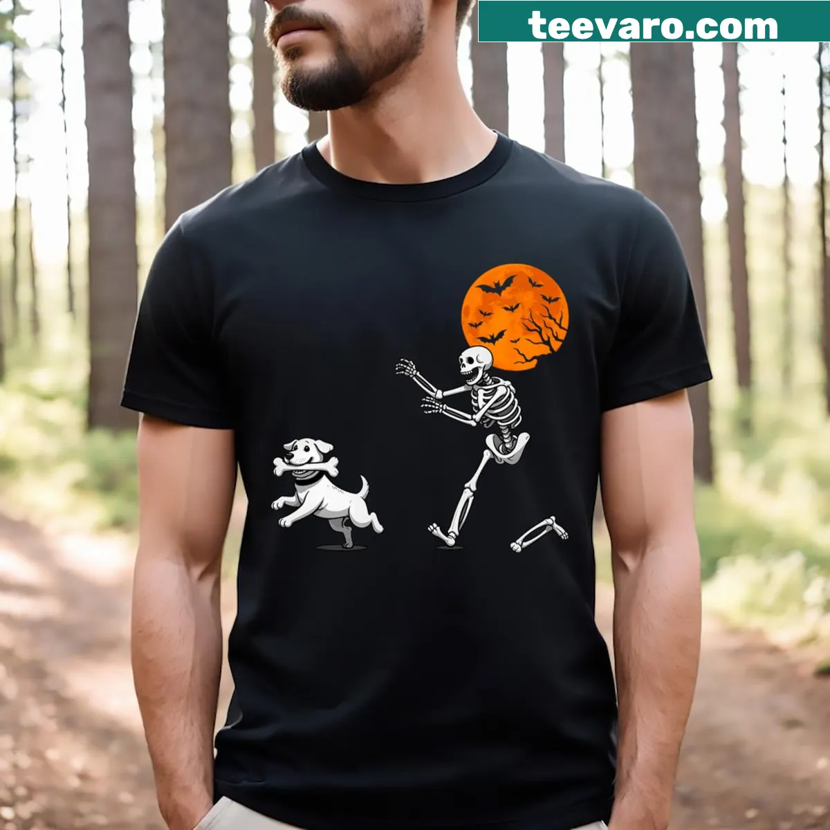 Halloween T-shirt with skeleton chasing a dog graphic — on a men's t-shirt