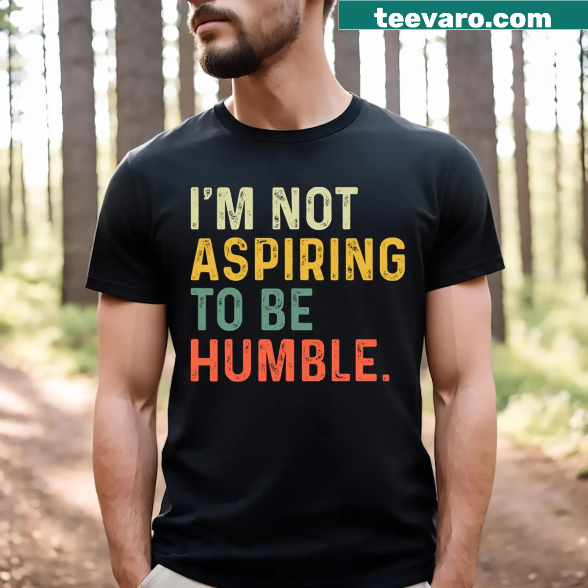 T-shirt featuring the phrase about not aspiring to humility — on a men's t-shirt