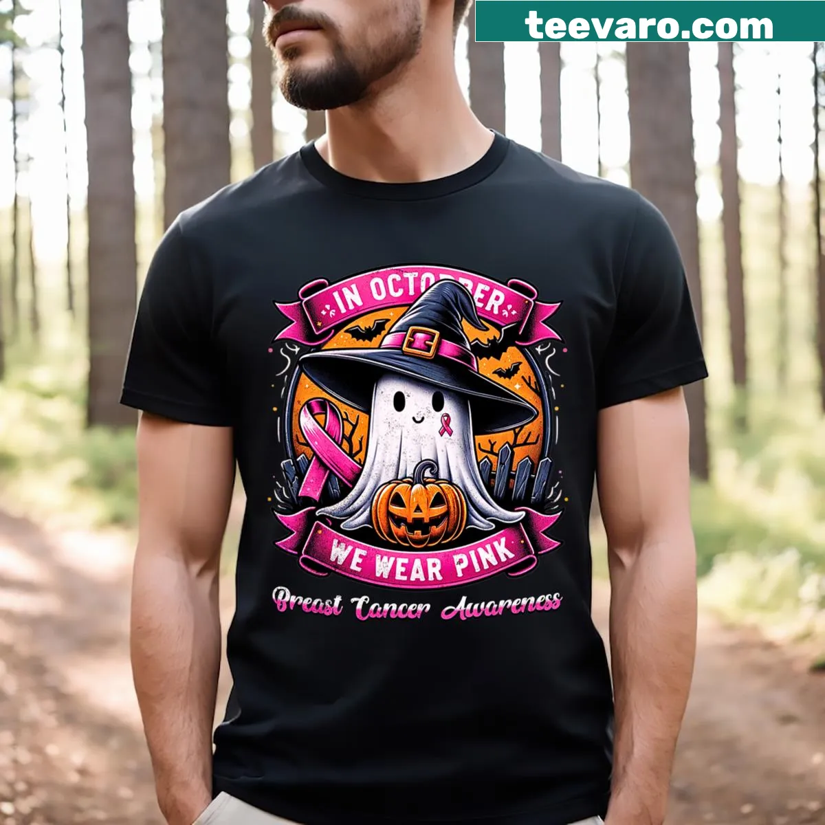 Halloween-themed t-shirt with ghosts and witches promoting Breast Cancer Awareness. — on a men's t-shirt