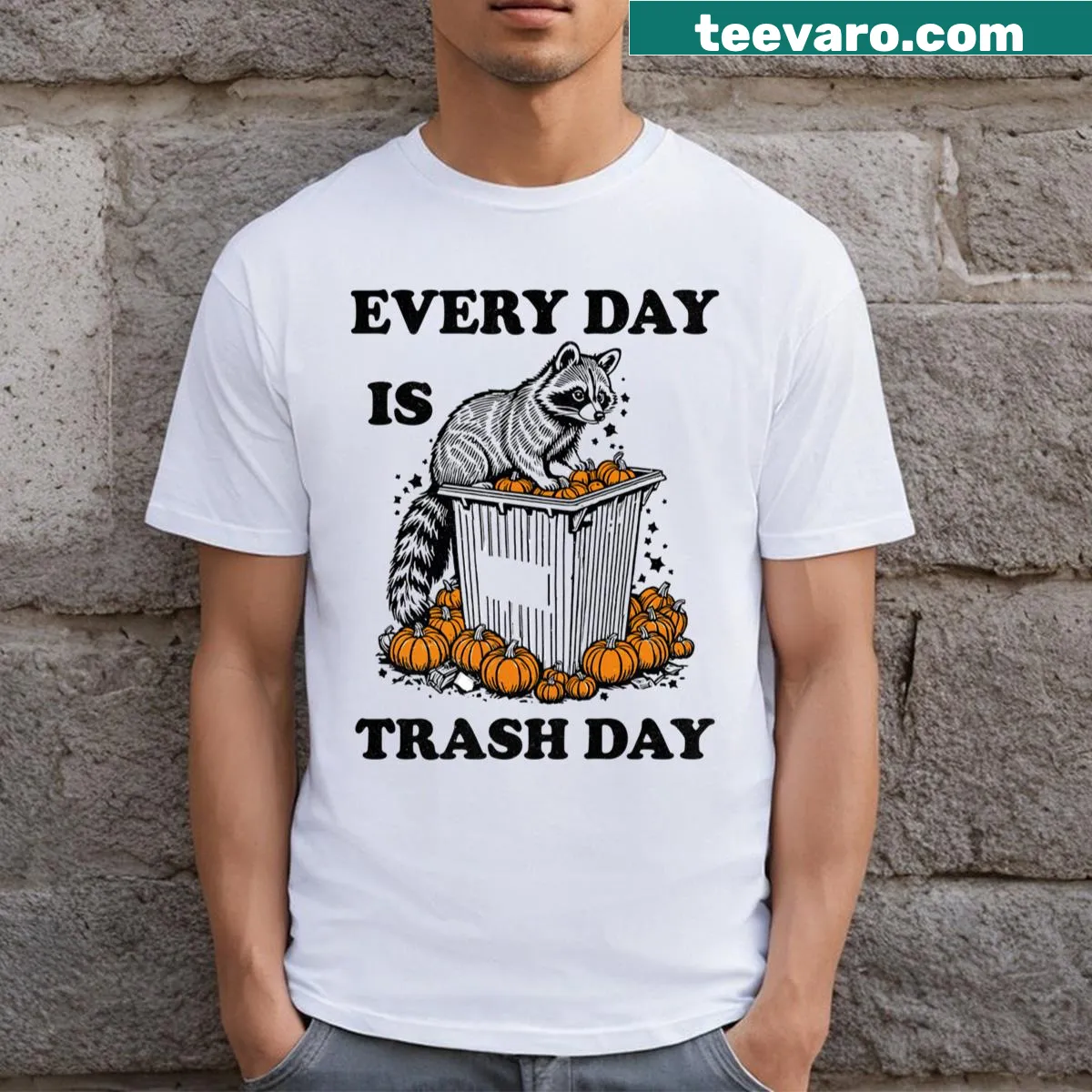 Funny T-shirt with raccoon designs and Halloween-themed text — on a men's t-shirt