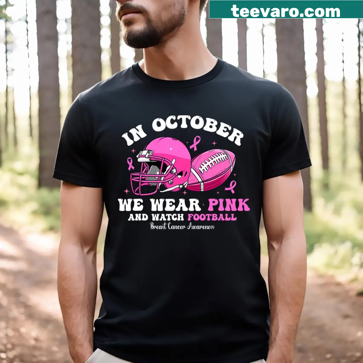 Football-themed breast cancer awareness t-shirt in pink — on a men's t-shirt