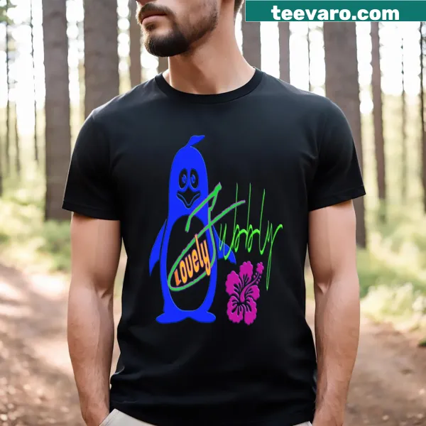 Cute T-shirt featuring a penguin with hibiscus flowers and a guitar
