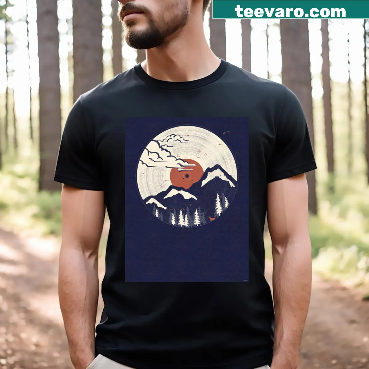 Badge-style graphic T-shirt with mountain theme — on a men's t-shirt