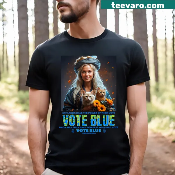 Charming Halloween T-shirt featuring a blue witch and flowers with a cat