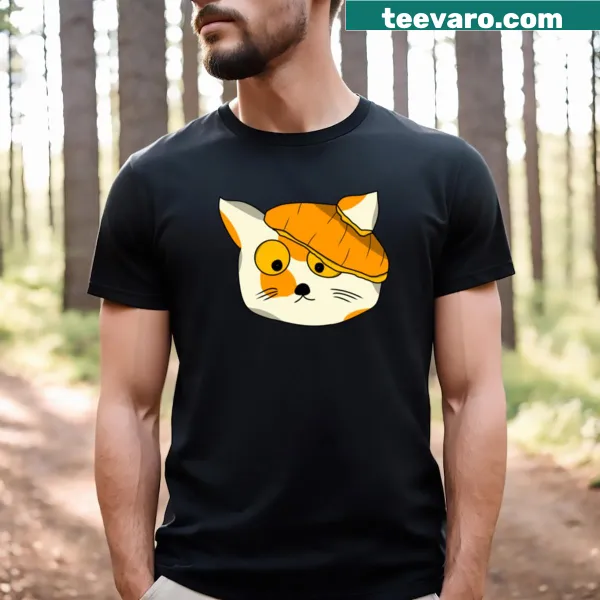 Whimsical cat wearing a pumpkin hat graphic on a T-shirt