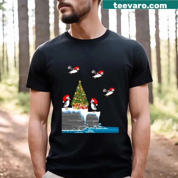T-shirt with puffins in elf hats on a sea cliff for Christmas