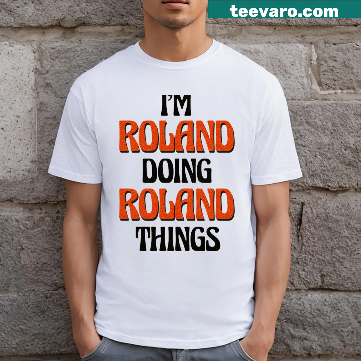 T-shirt featuring the phrase 'I'm Roland Doing Roland Things' in bold lettering — on a men's t-shirt