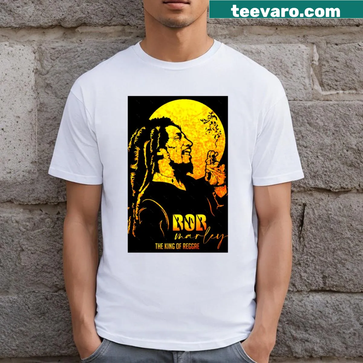 Graphic t-shirt celebrating Bob Marley, the King of Reggae — on a men's t-shirt