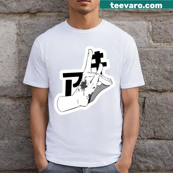 Bold illustration of a pierced hand on T-shirt