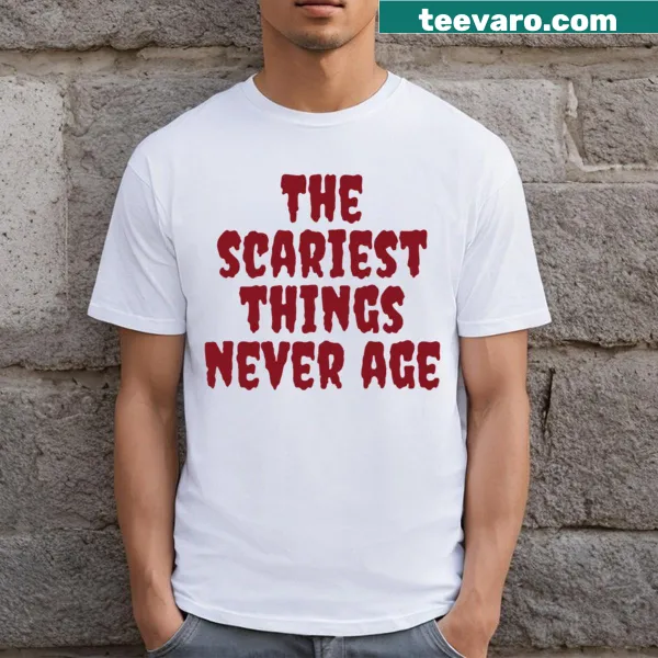 Vintage horror graphic with text on a T-shirt, saying 'The Scariest Things Never Age'