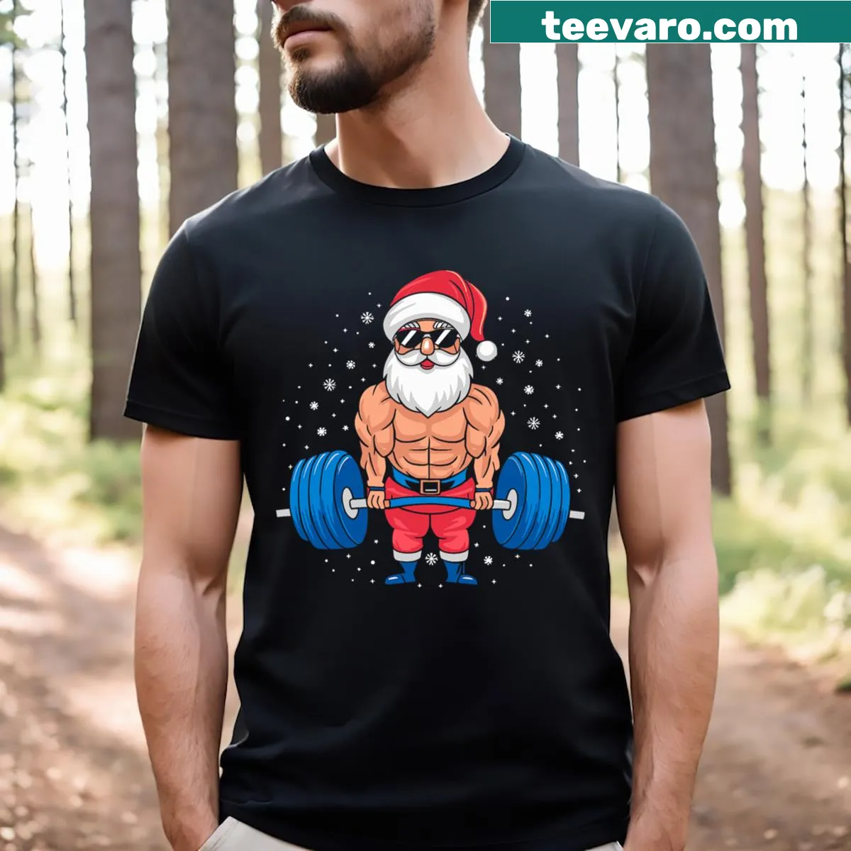 Funny holiday-themed Santa lifting weights graphic t-shirt — on a men's t-shirt