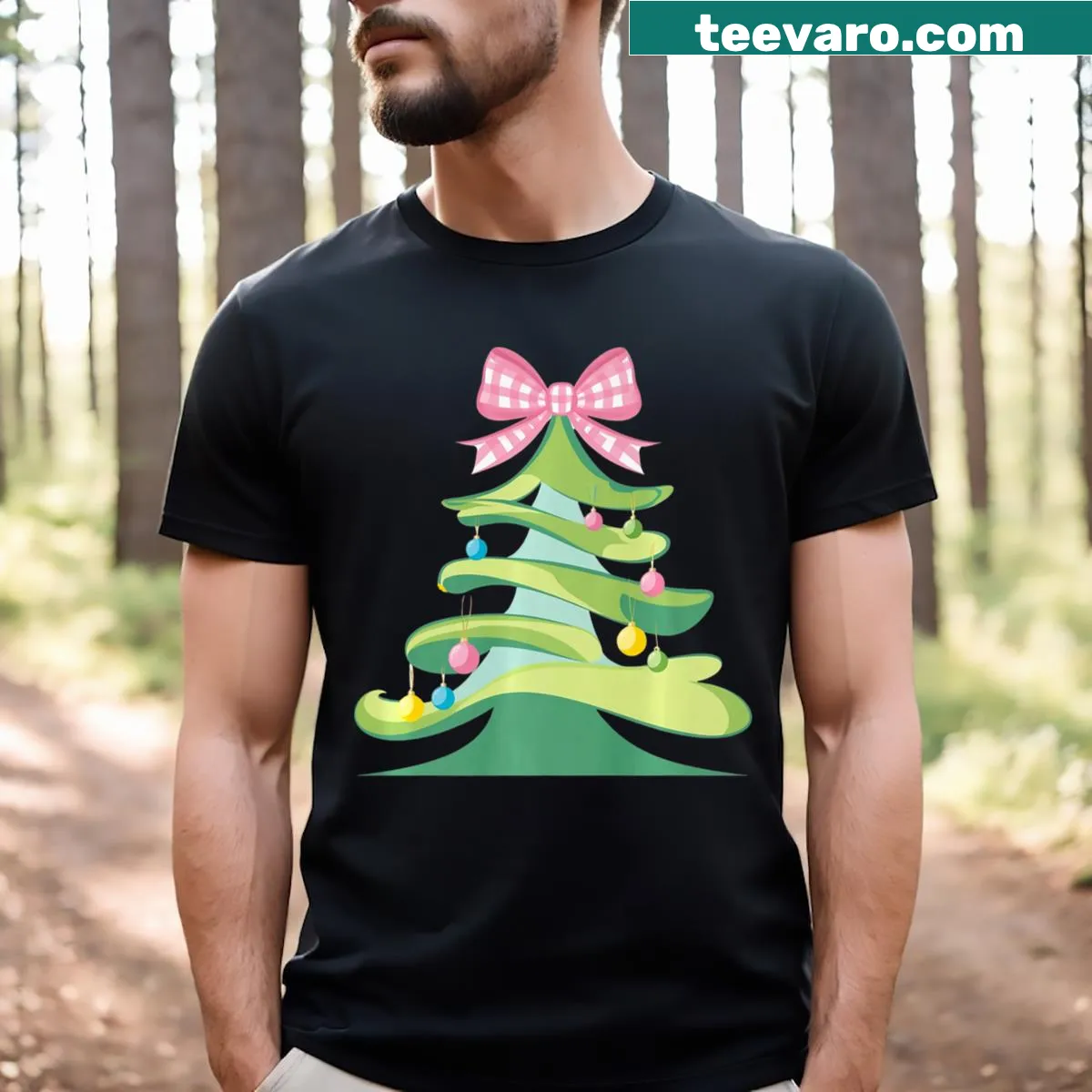 Girly Christmas T-shirt with pink tree and bow illustration — on a men's t-shirt