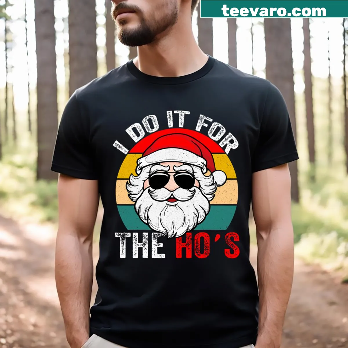 Funny Santa face t-shirt with the phrase I Do It For The Hos — on a men's t-shirt