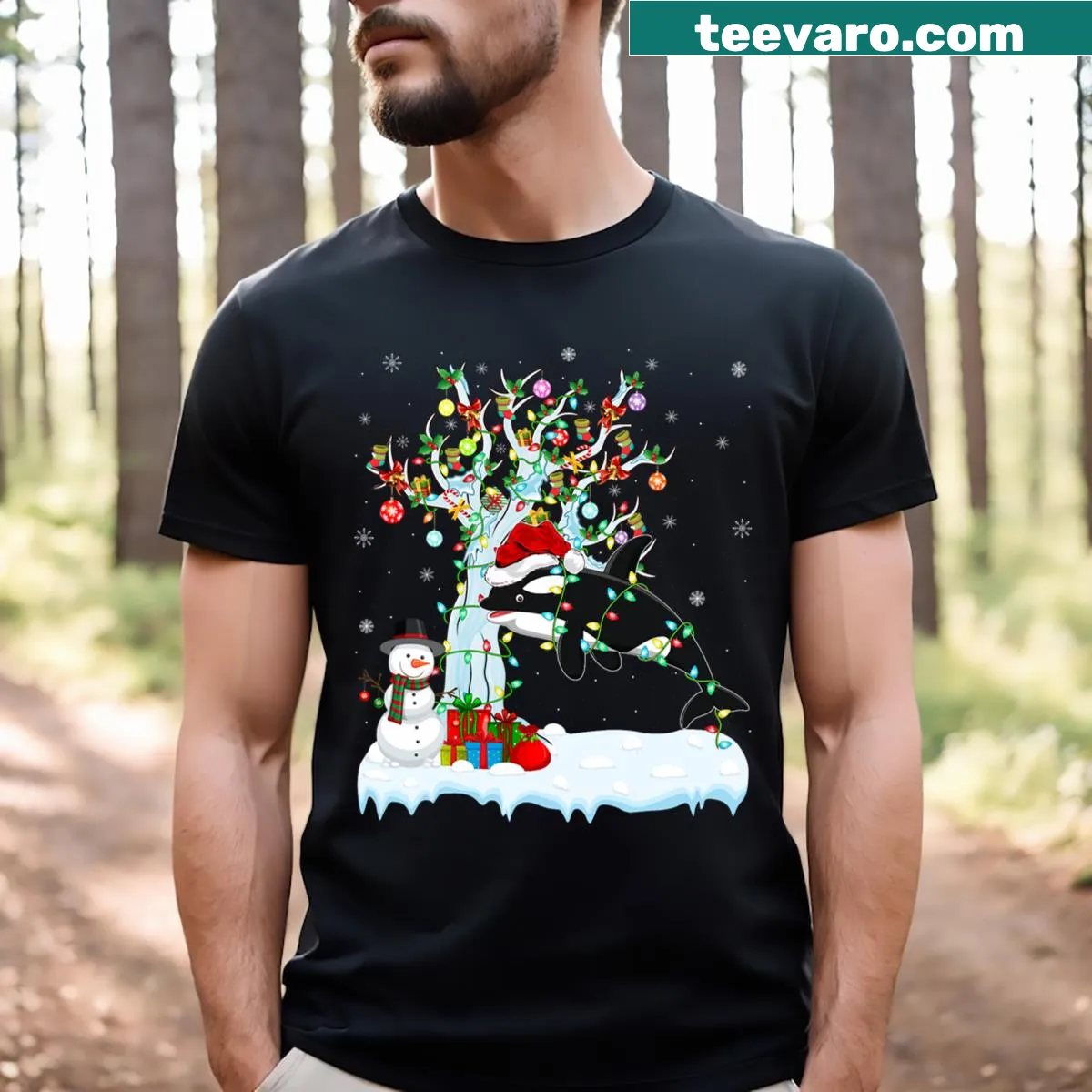 Whimsical orca Christmas T-shirt with Santa hat and lights — on a men's t-shirt