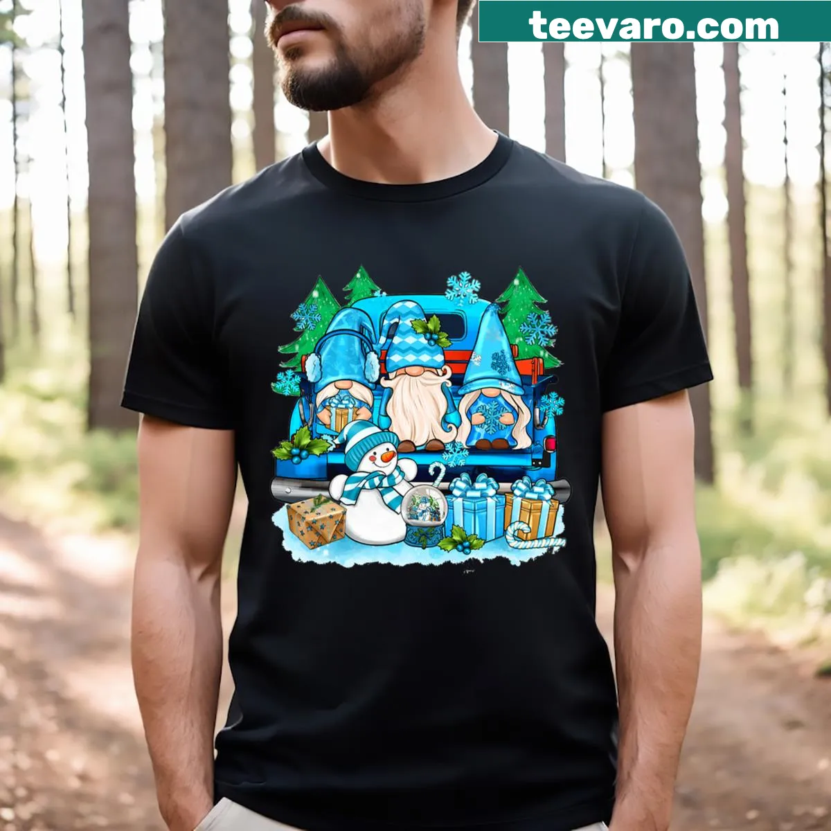Christmas-themed T-shirt featuring winter gnomes, a snowman, and a truck. — on a men's t-shirt