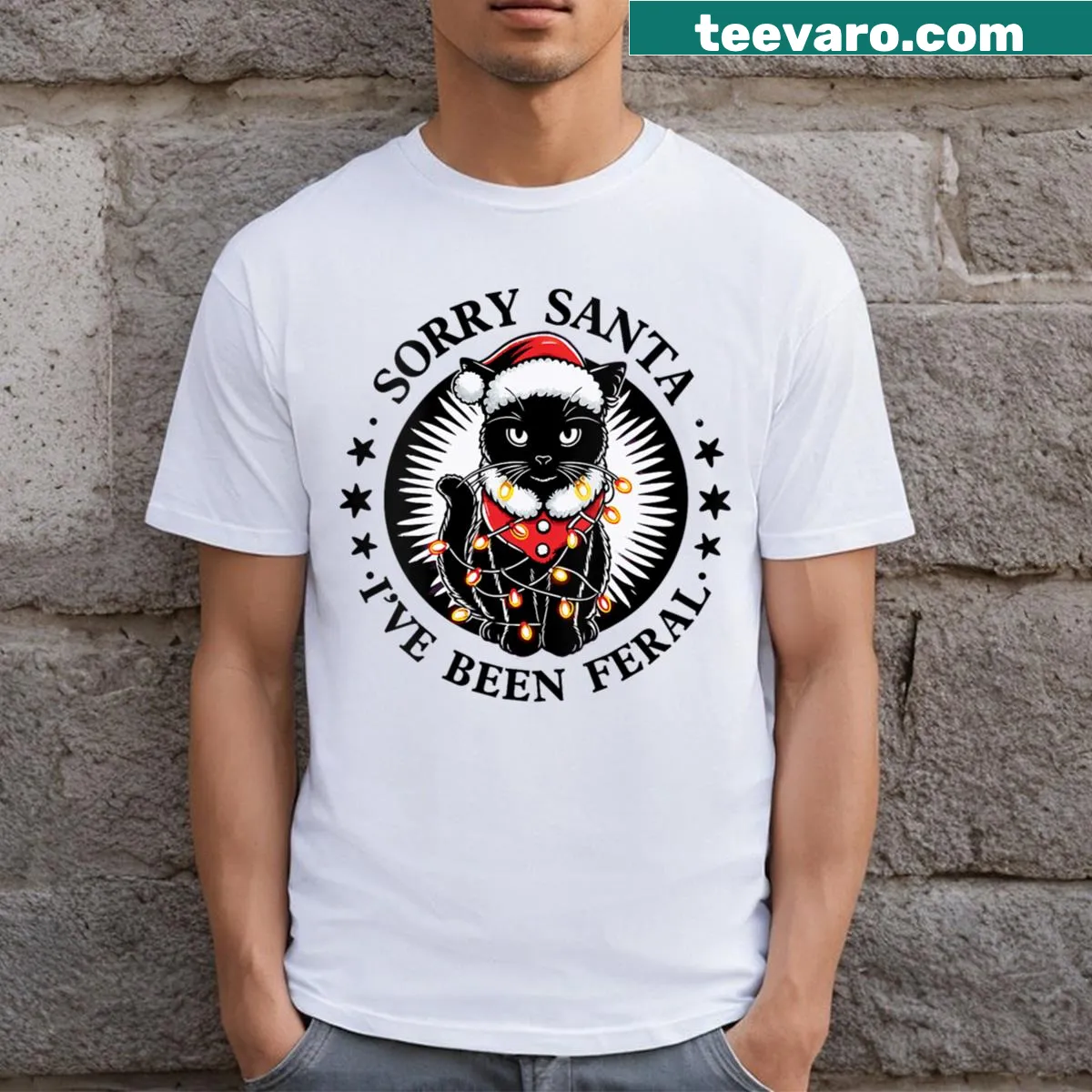 Playful black cat t-shirt with Sorry Santa I've Been Feral text — on a men's t-shirt