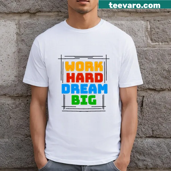 Bold typography on a motivational T-shirt about hard work and dreams.