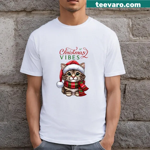 Festive t-shirt with a cute cat design celebrating Christmas.
