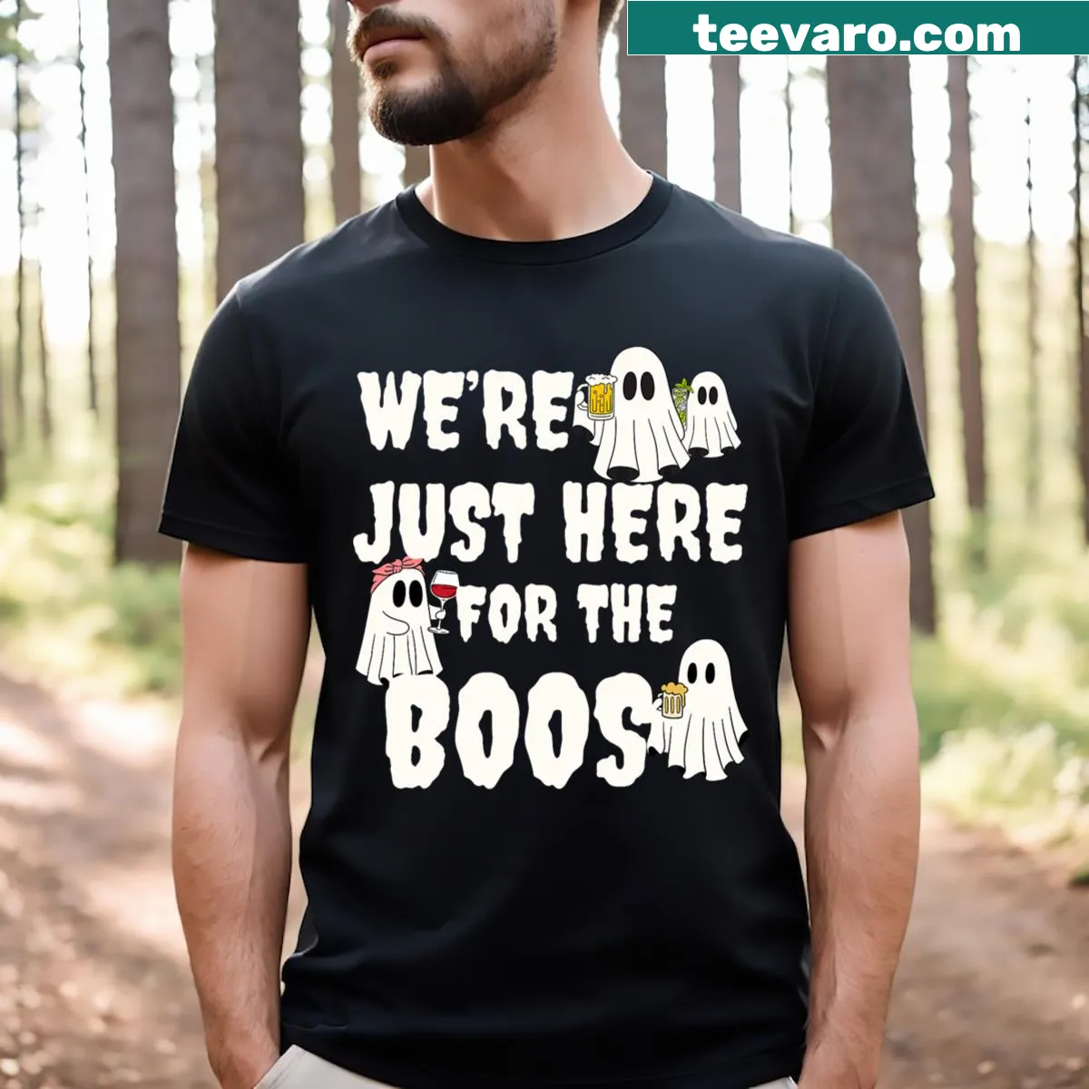 Funny Halloween T-shirt with ghost and text We're Just Here For The Boos — on a men's t-shirt