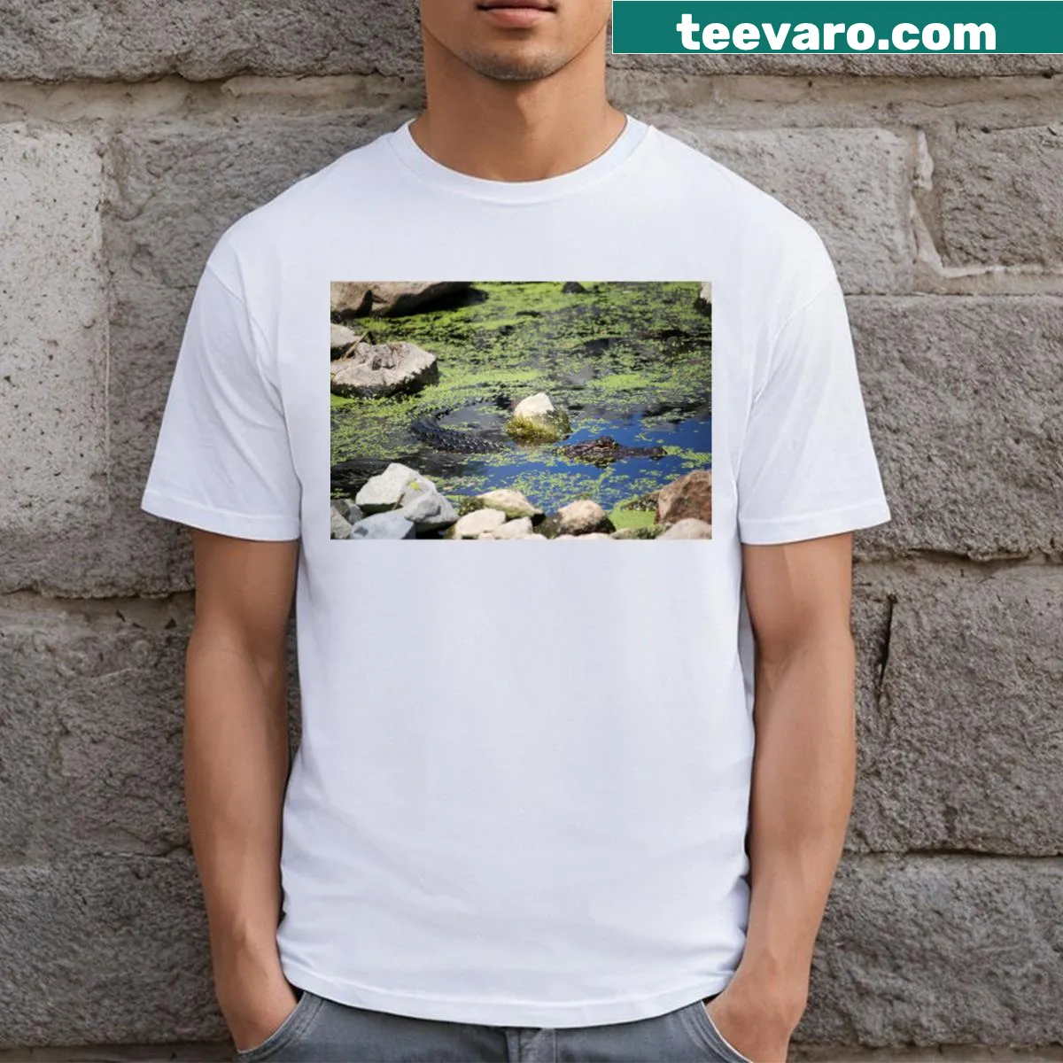 Reptile silhouette against camouflage pattern on T-shirt — on a men's t-shirt